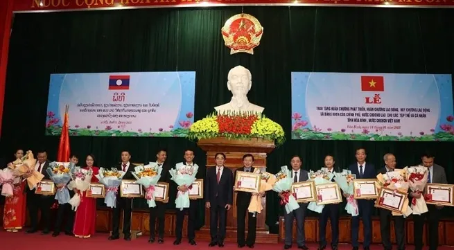 Hoa Binh collectives and individuals honoured with Lao accolades for education project