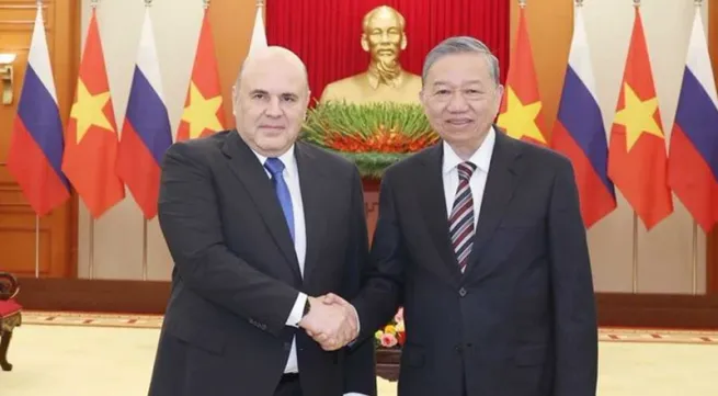 Party chief receives Russian PM