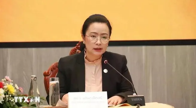 Vietnam, Laos promote payments in local currencies to boost trade