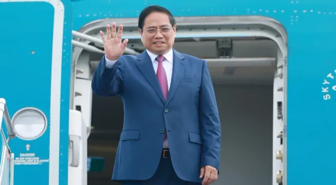 PM Pham Minh Chinh leaves for WEF meeting, working visit to China
