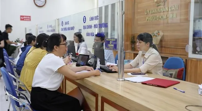 Hanoi's two-tier local administration operates effectively, satisfies citizens