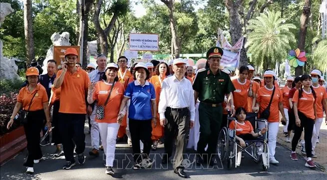 More than 5,000 people join charity walk for AO victims