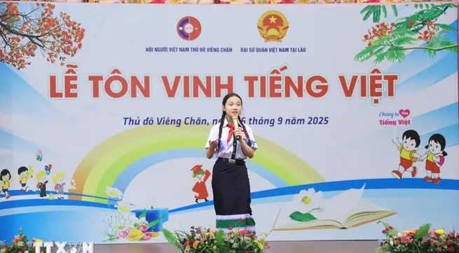 Vietnamese community in Laos honour mother tougue