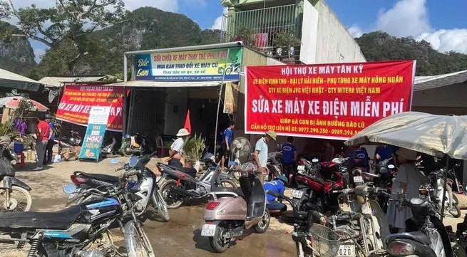 Volunteer ‘doctors’ bring life back to motorbikes, electronics after floods