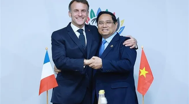 Gov't leader meets with French President, OECD Secretary-General in South Africa