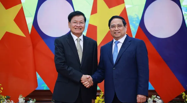 Prime Minister welcomes Lao Party General Secretary and President in Hanoi