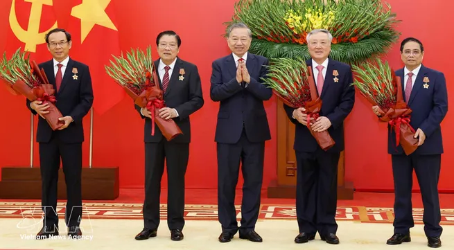 Party chief presents elite honours to incumbent, former leaders